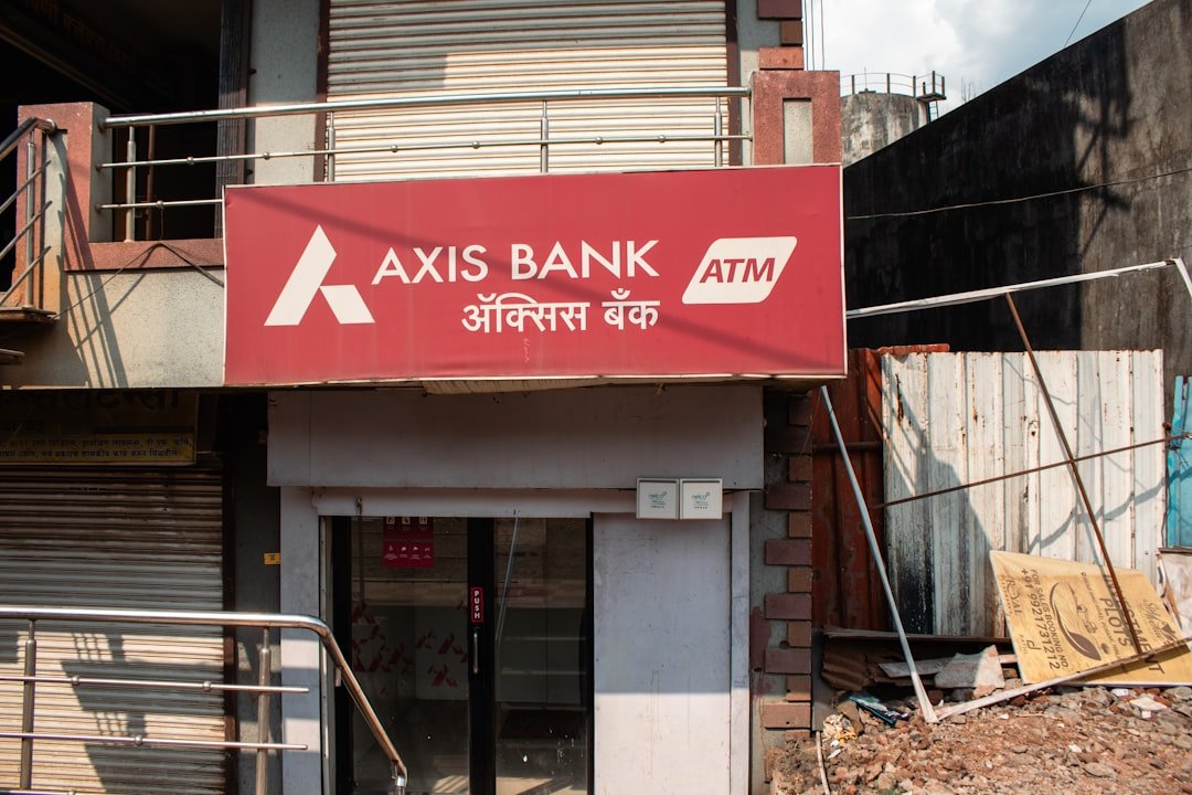 A bank building with a sign on the front of it