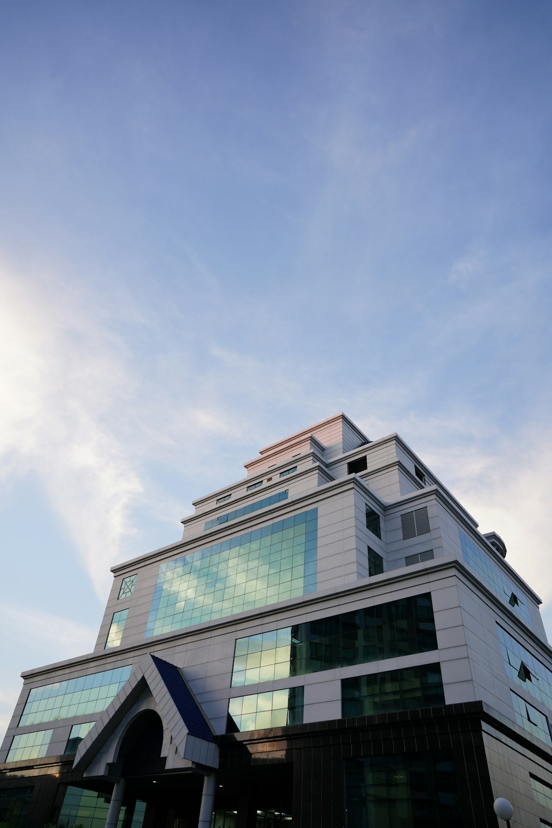 a tall building with a lot of windows on top of it