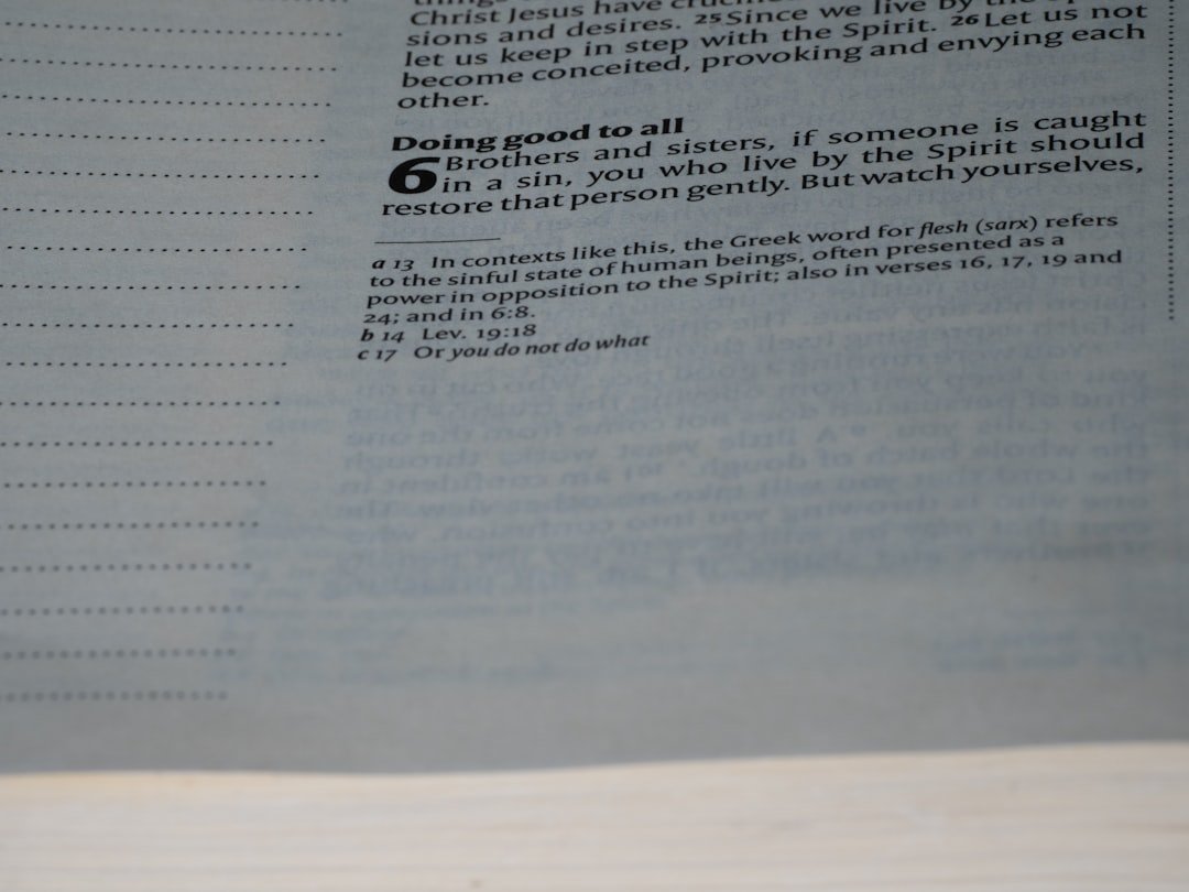 A close up of an open book with text