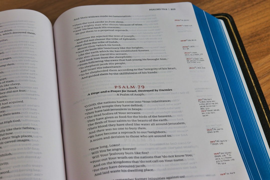 white book page on brown wooden table