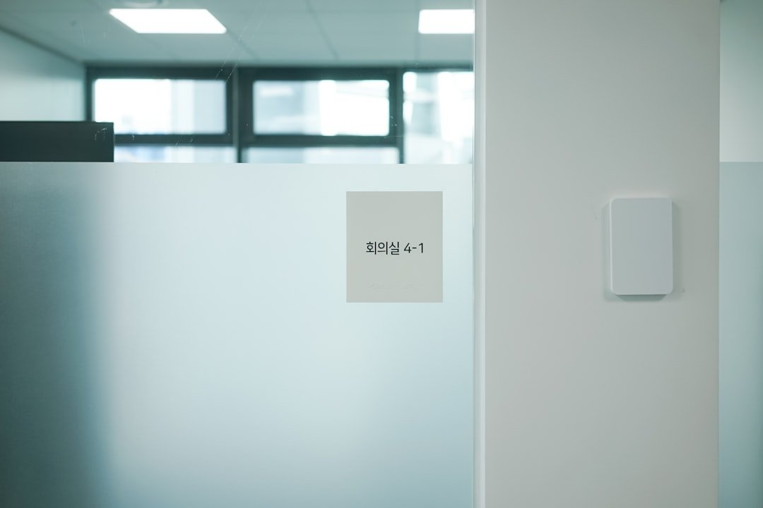 a door with a sign on it in a room