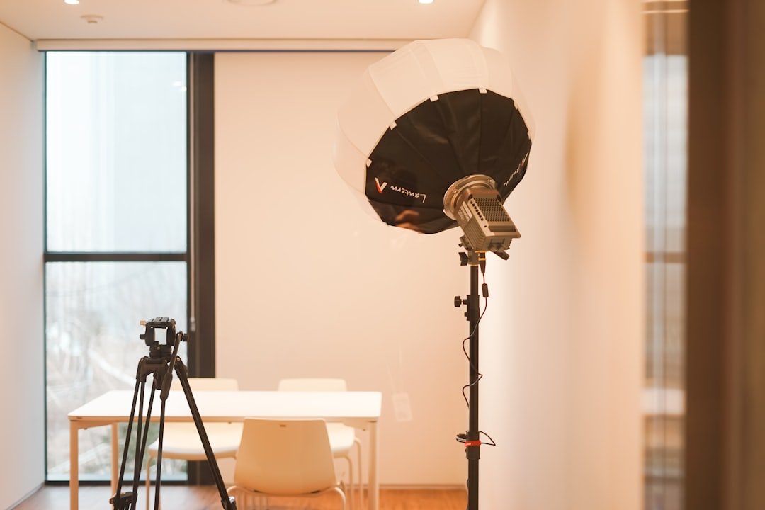 a camera and a tripod in a room