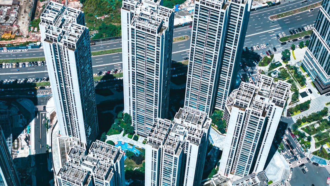 an aerial view of a city with tall buildings