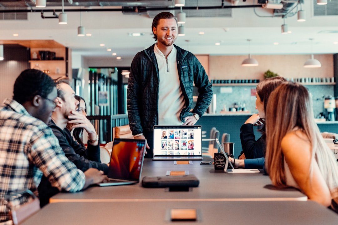 a group of people sitting around a table